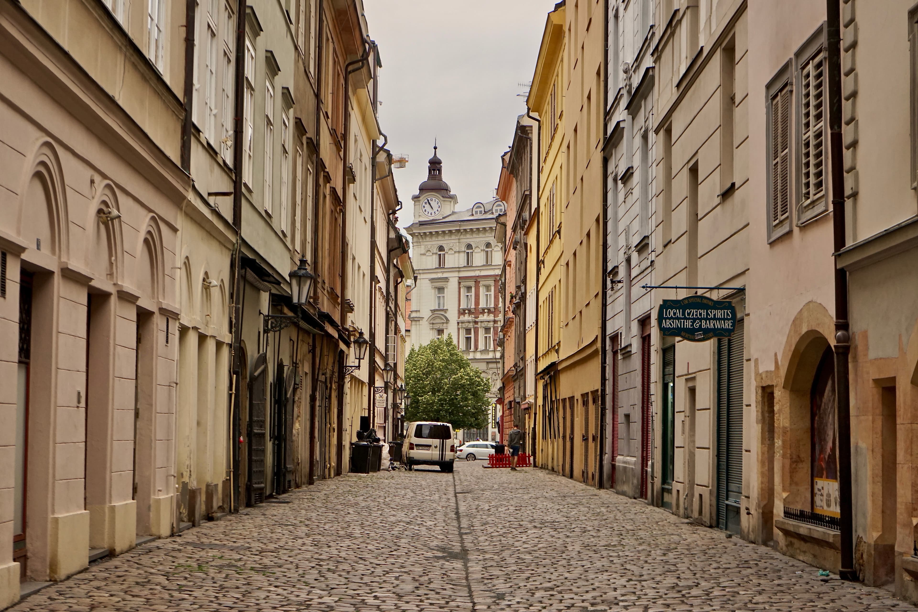 Cobblestone street lined with buildings in Prague