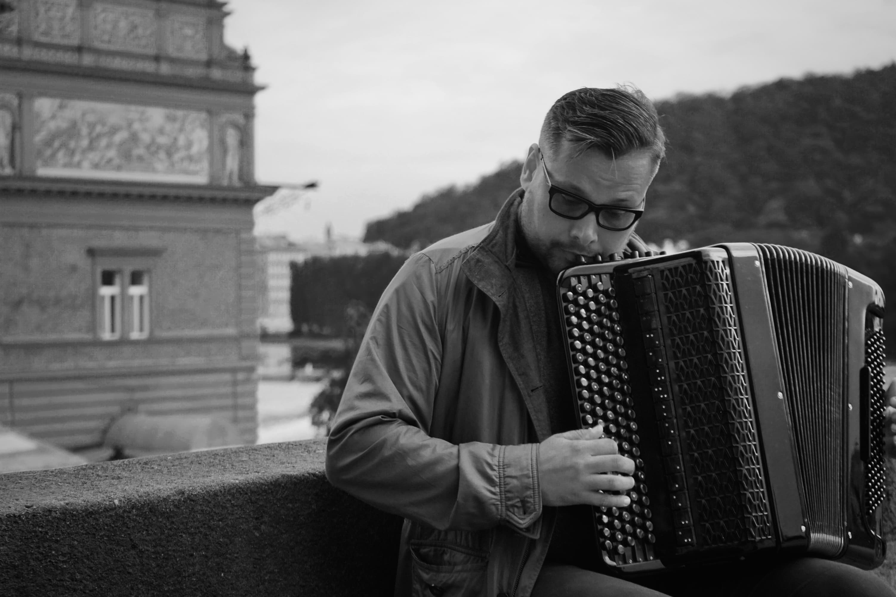 Accordion player performing on a city street