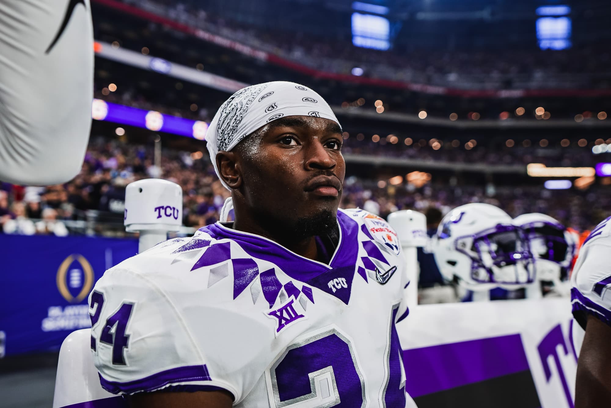 TCU player number 24 in a bandana on the sideline
