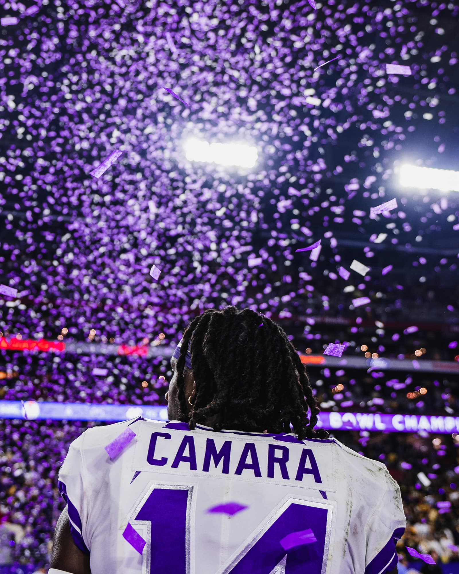 Camara under purple confetti after the Fiesta Bowl