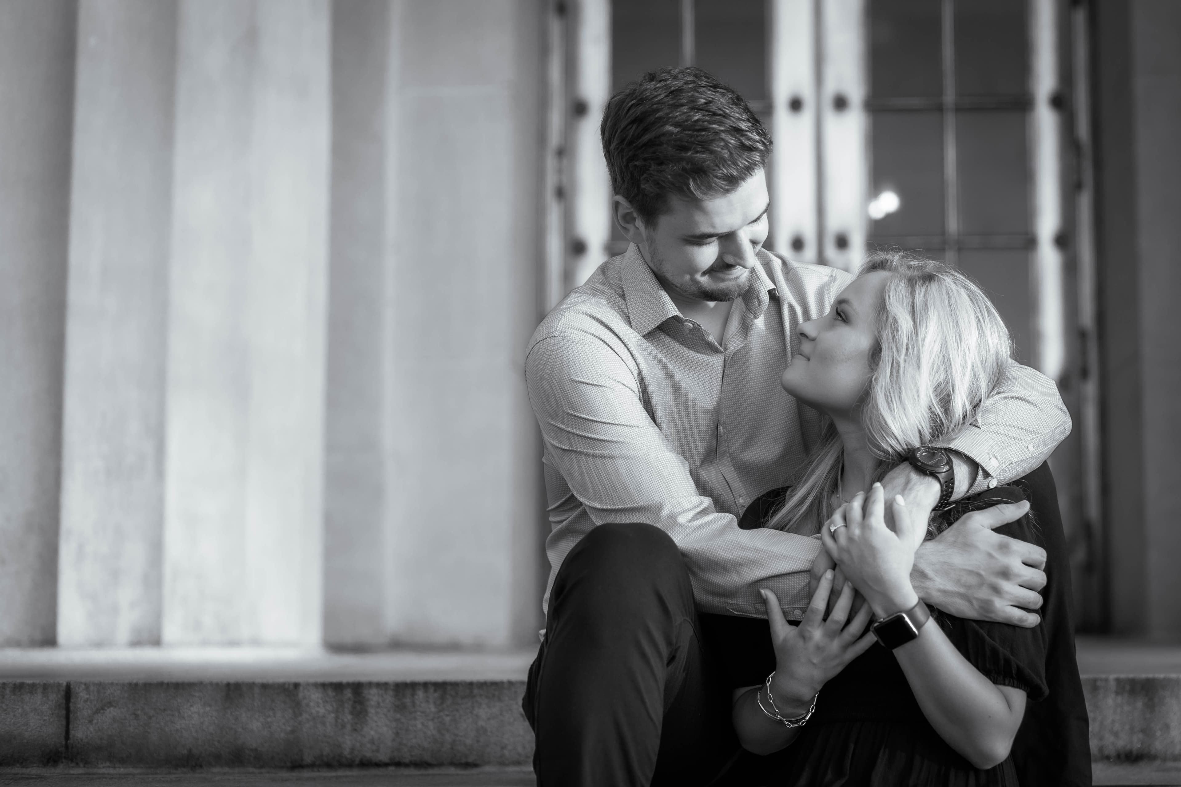 Black and white engagement portrait on stone steps
